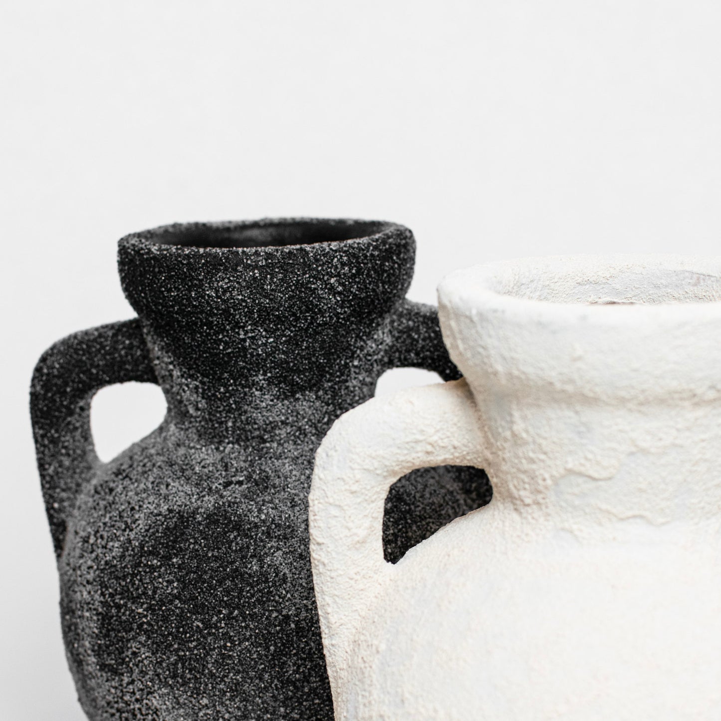 black and white terracotta vases
